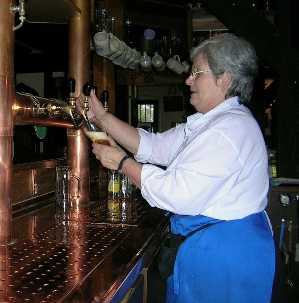  Wolfsburg, Germany.  Altes Brauhaus zu Fallersleben.  Brauerei seit 1765!  A happy bartender.  In 1967 I first noticed those style ceramic mugs, hanging above her head, at the Hofbräuhaus of the  Hofbräu Brewery Munich .  What was startling was at t