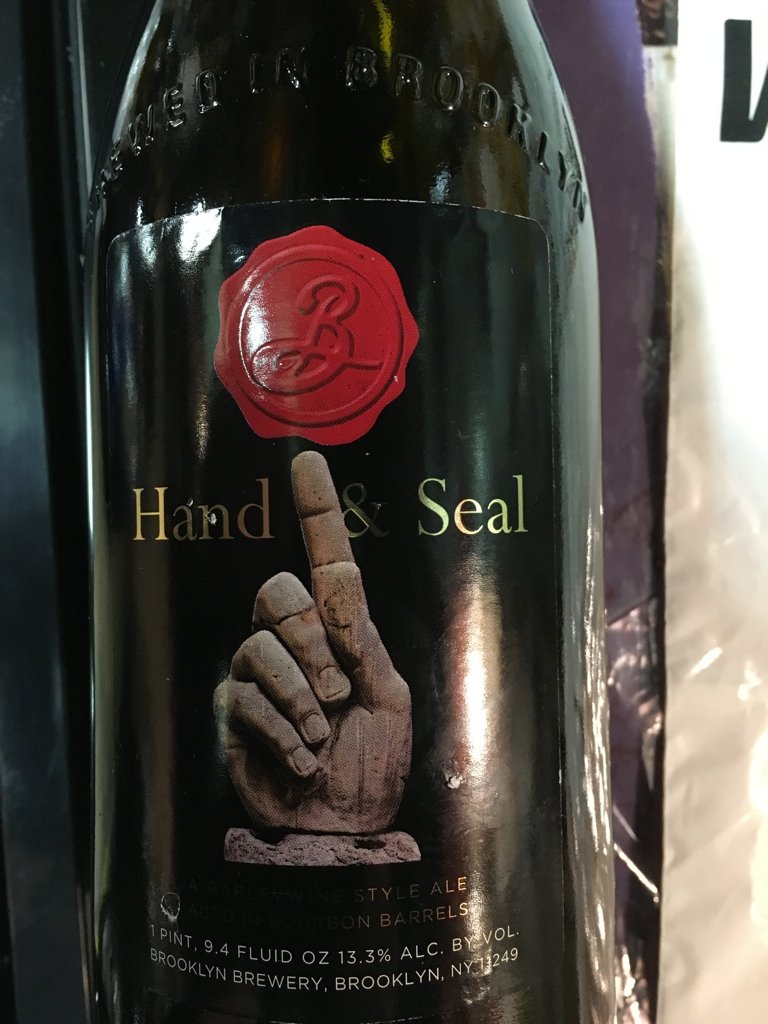  Gotta love this one:  ”Hand &amp; Seal Barley-wine style ale in the 20th year of his reign, our Brewmaster brought to earth a new wonderment for the people. Barleywine-style ale...an old and once exclusive drink of the British nobility,... produced 