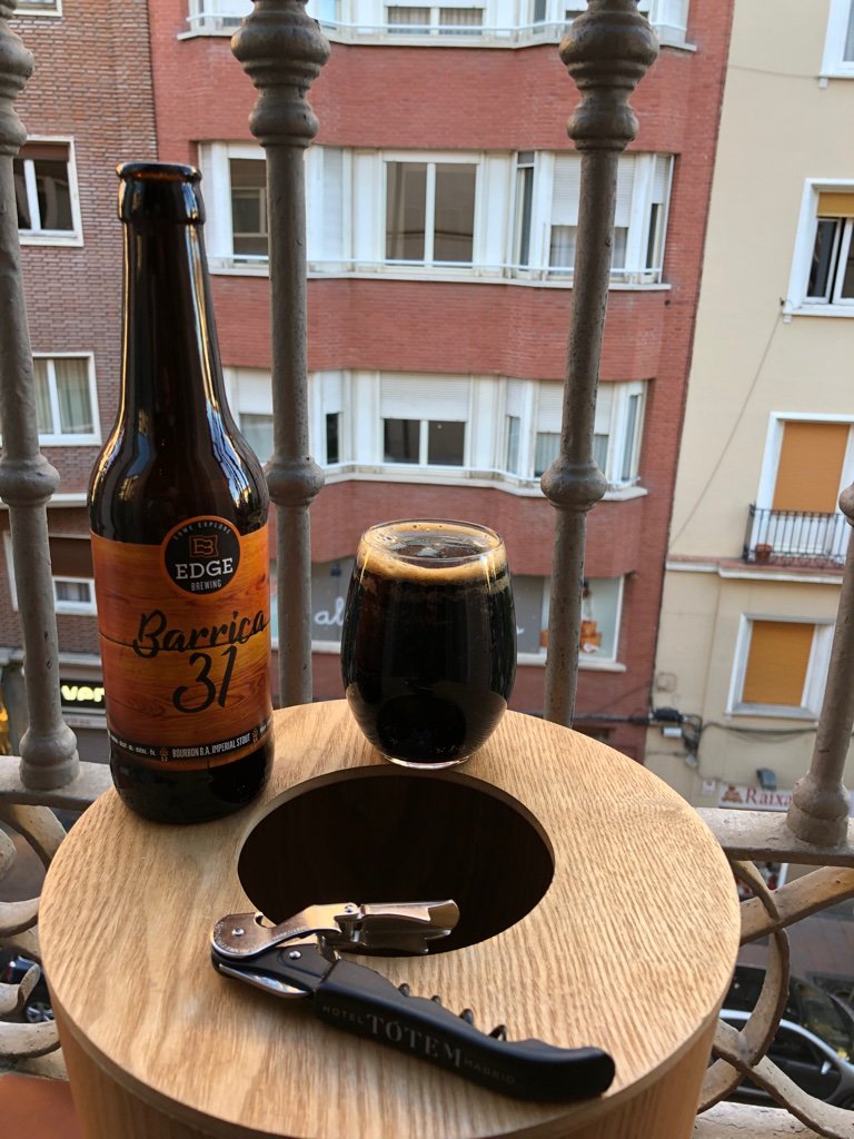  Madrid, Spain.  In balcony of Tótem Madrid Hotel.  Beer bought at The Growler in Barcelona. 