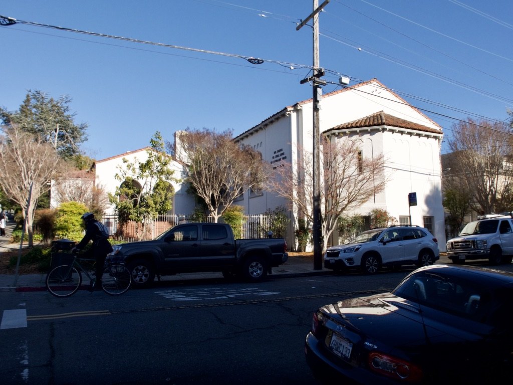  The Church of Jesus Christ of Latter-day Saints.  And, across the street… 