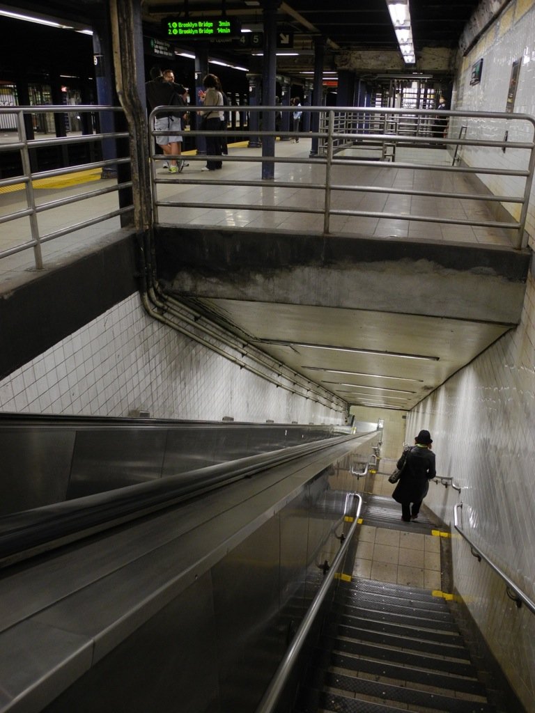 It can be a long way down on stairs or on an escalator.  Elevators are  not always easy to find, nor always working.