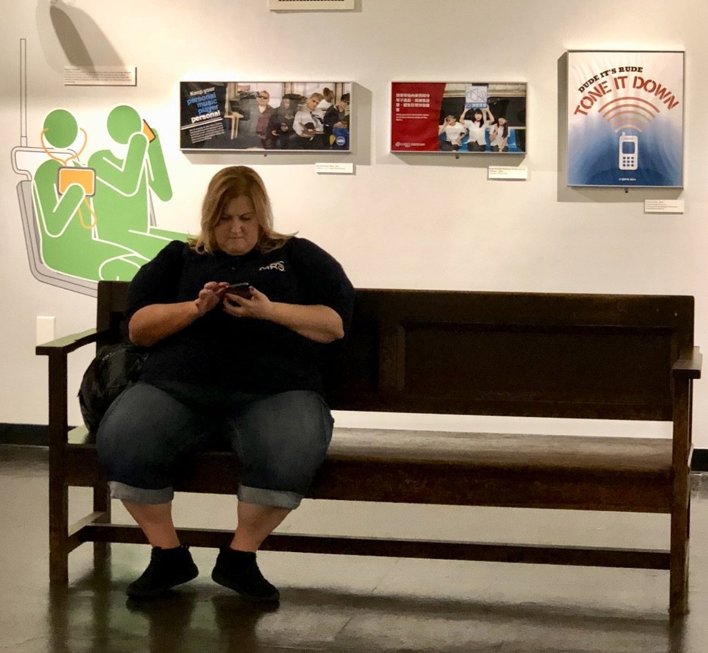  Sept. 2018 -  New York Transit In Comics  @ N Y Transit Museum’s downtown Brooklyn location.  At one time there were no middle armrests on subway platform benches.       