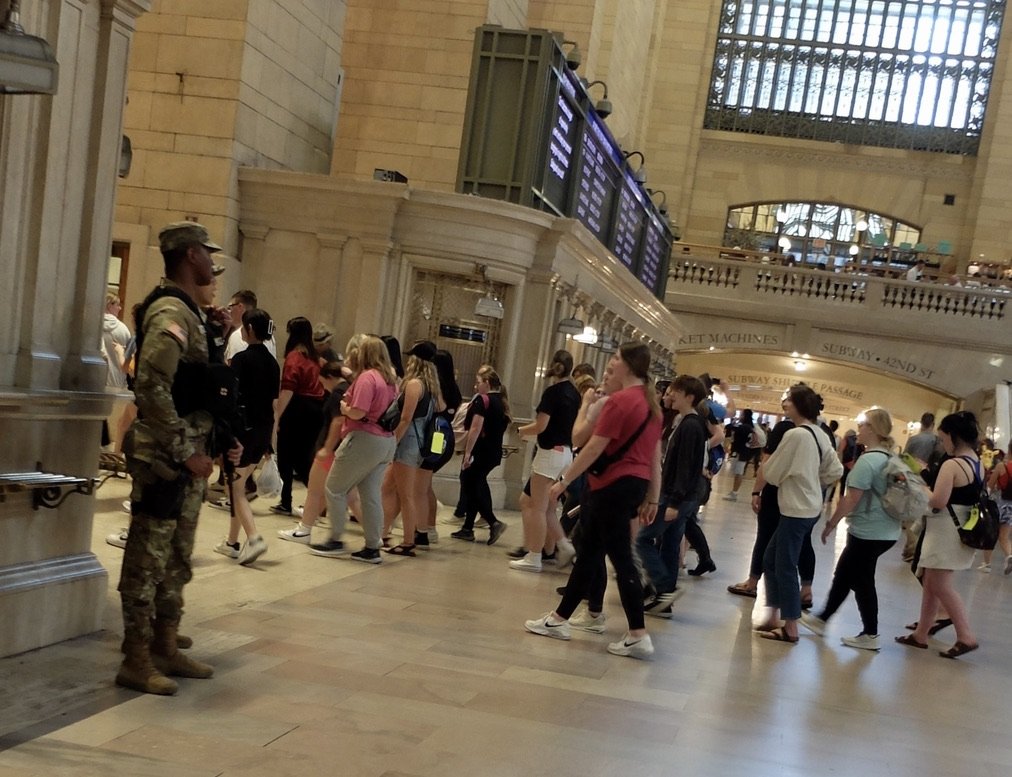  Grand Central Station.  Opposite these Nat’l Guard, one with a submachine gun, were two NY State Troopers, one also with a submachine gun.  Yikes. 