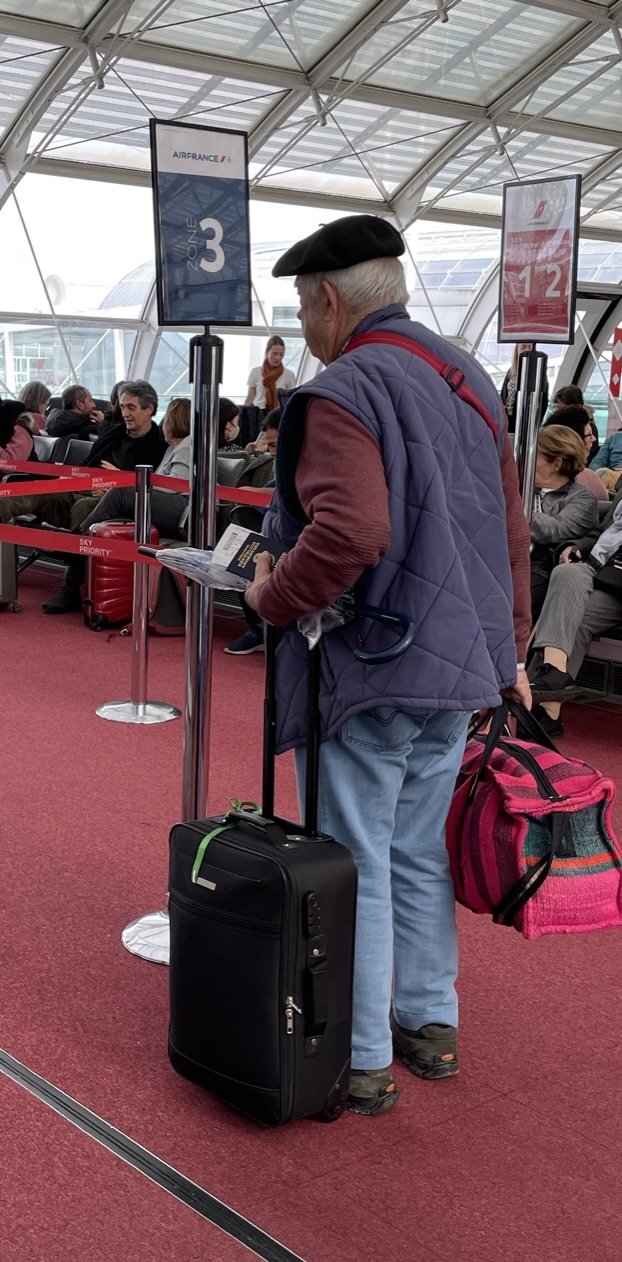    I thought finally another Frenchman in a beret.  But no, it was a fellow from Argentina in a boina.  Chas. de Gaulle airport. 