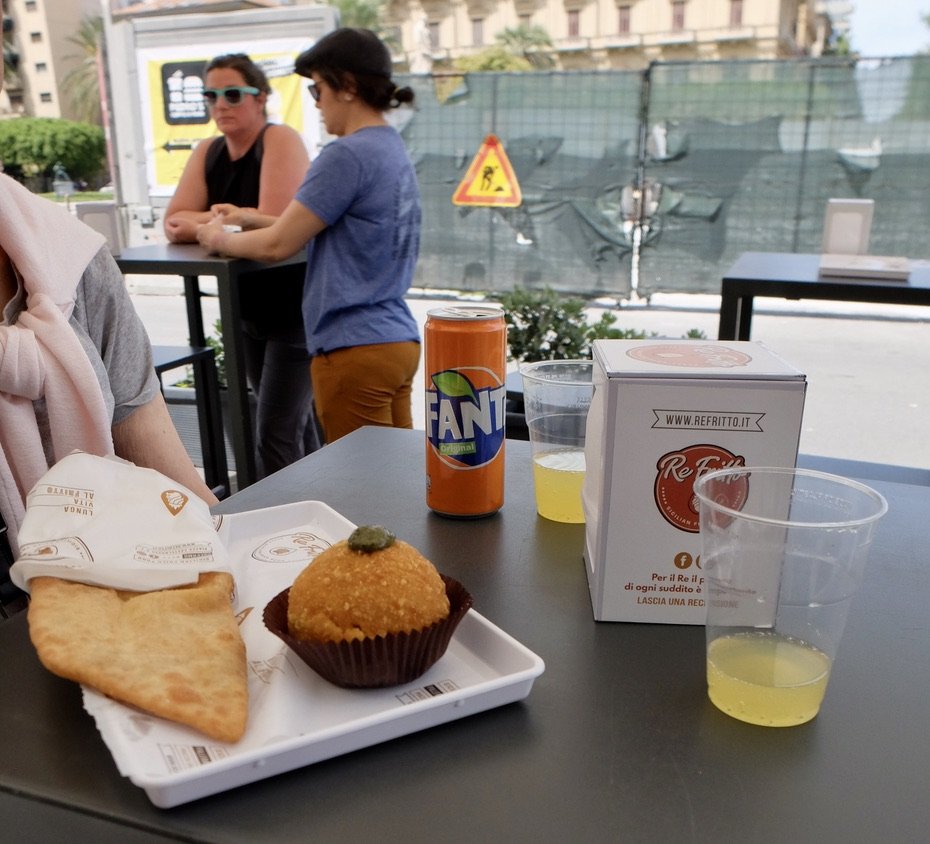  Street food is a big draw in Palermo.    I had watched several You Tube videos about it. So, I knew we had to try arancini &amp; fried pizza.  Perfect with a FANTA.  