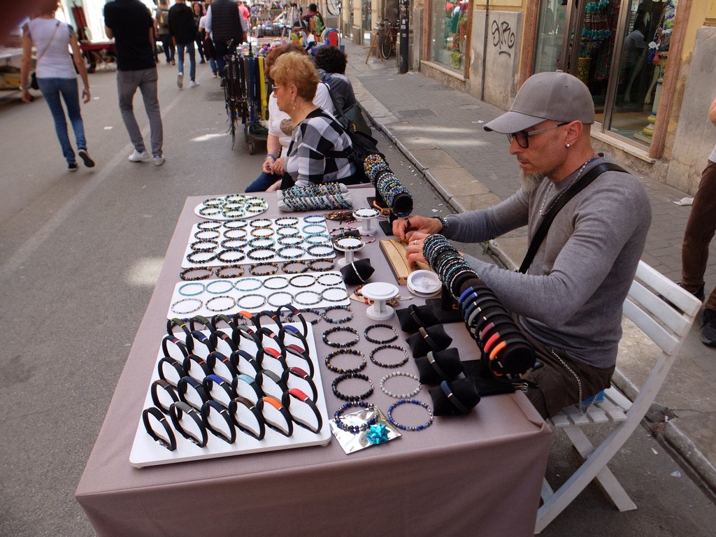  Many vendors.  We found that the better crafts people would be there one day &amp; maybe not the next.   We bought bracelets from this fellow. 