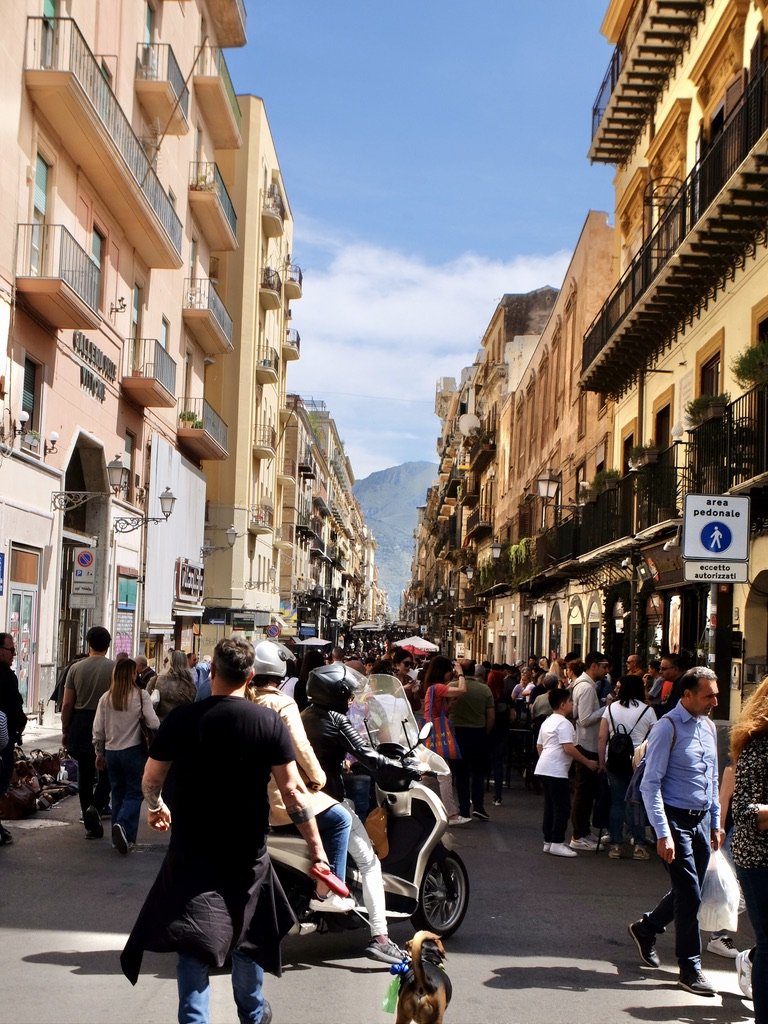  The art of maneuvering a scooter through la passeggiata. 