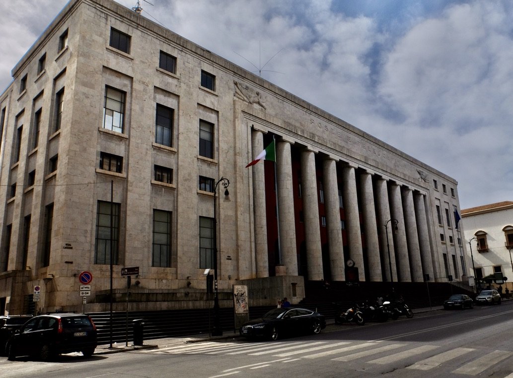 The central post office,  Palazzo Postale,  is an example of Fascist era architecture.  
