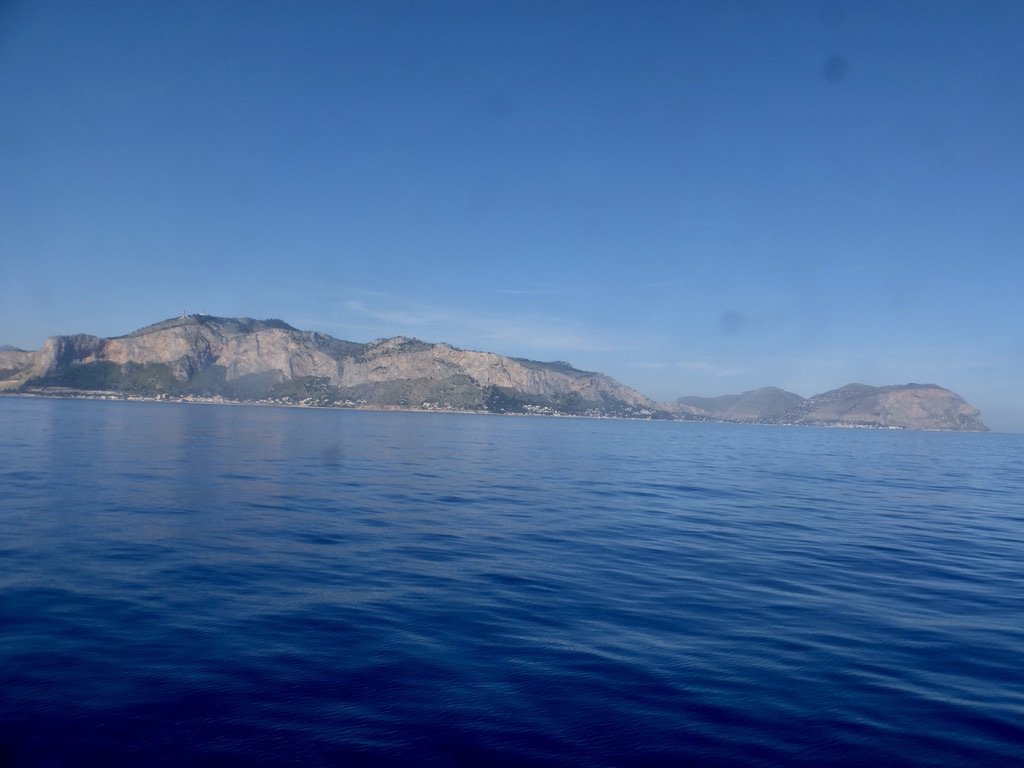  Isola di Ustica from the hydrofoil ferry.  A little over 1.5 hour journey from Palermo across the Tyrrhenian Sea.  The windows of the ferry were not very clean. 