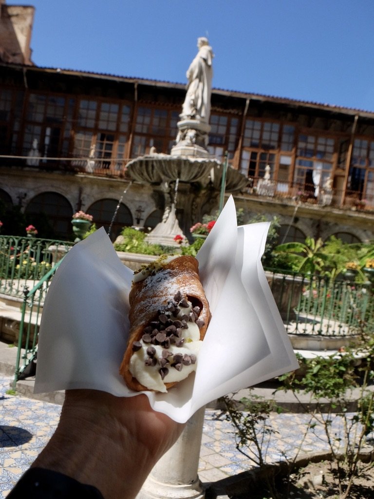  A super cannoli in the courtyard of Sweets of the nuns of the ancients - Monastery of Santa Caterina D'Alessnadria. 