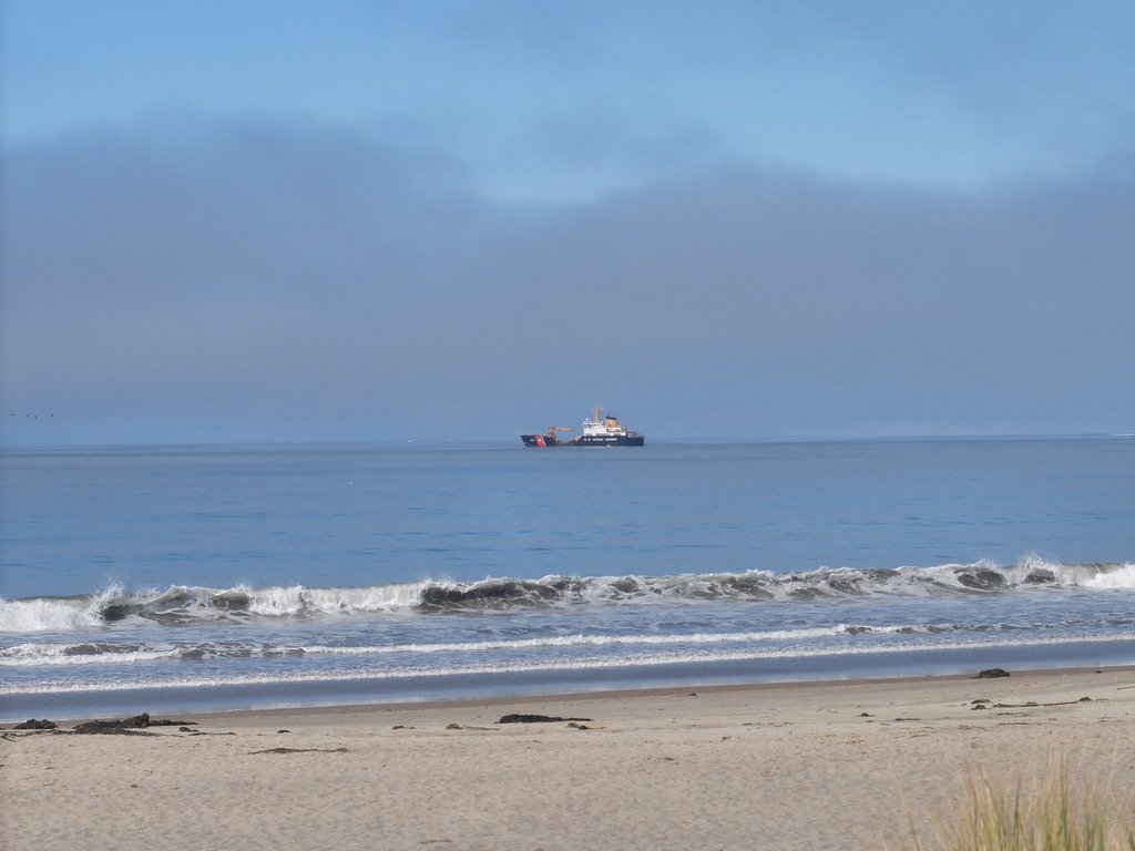  We thought this U.S. Coast Guard vessel was there to help get the   Chandalar  back afloat.  But no. 