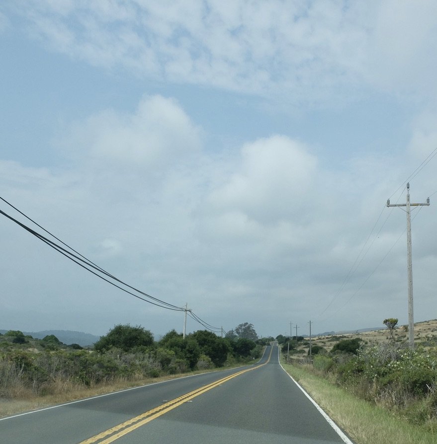 Driving to Nick's Cove along Hwy 1 beside Tomales Bay.