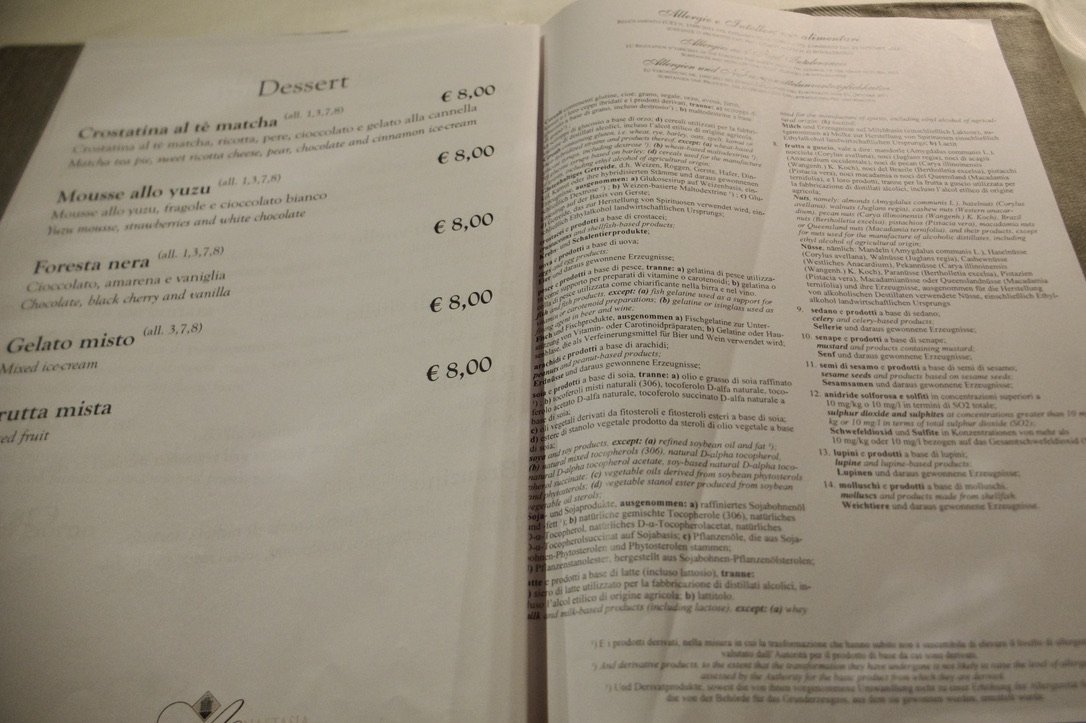  Annotated listing of food allergies at the end of the menu.  We saw this in several other restaurants. This listing was amazingly detailed &amp; in three languages.  Dinner at Abbazia Santa Anastasia.   