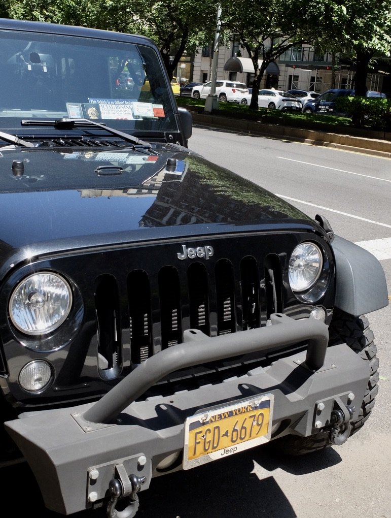  I thought that this Jeep was a little over the top.   Then I looked closer: -"This Vehicle Is on Official Business - United Chaplins State of New York."  A very busy chaplain.  