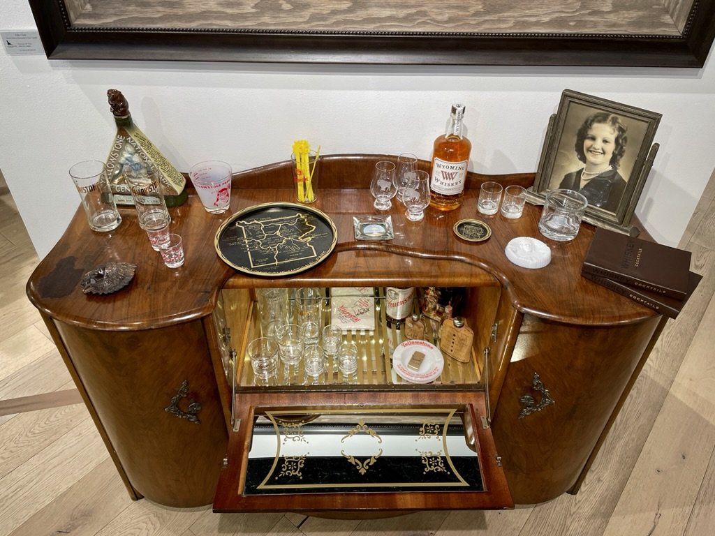  Vintage whiskey display at GARY CRANDALL’s gallery in Jackson.  Medicine Bird Gallery (aka Gray Crane Studios) in Jackson. https://graycranestudios.com/  After many days of walking around Jackson, we finally stopped in only one of the scores of gall