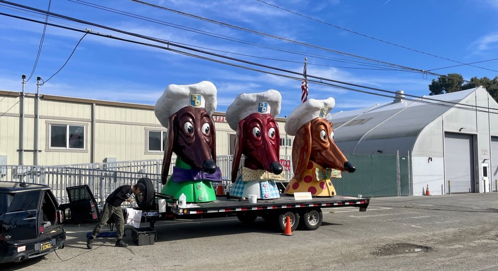  Doggie Diner heads being restored in front of San Francisco Fire Department 48, Treasure Island.   