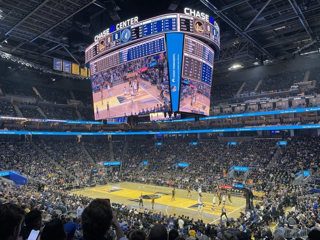  In the Chase Center seen from Section 101, Golden State Warriors vs. Minnesota Wolverines.  We were low enough to see the plays but high enough not to hear the sneakers squeaking on the wooden floor. 