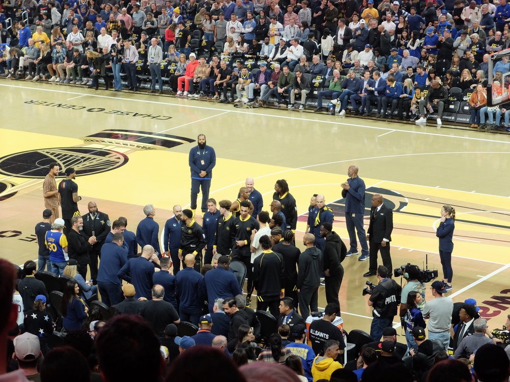  …waiting.   “Draymond Green was ejected after putting Rudy Gobert in a headlock &amp; two other players were thrown out…”   Stef Curry (on the left of the team) was listed as inactive for the game. He  was wearing, what looked like, pajamas that pro