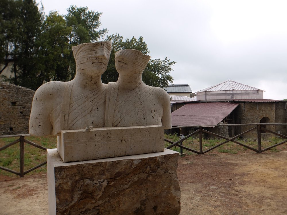  “Villa Romana del Casale.COUPLE FOR ETERNITY by Polish sculptor Igor Mitoraj.  The couple is represented half-length, with fragmented heads and shoulders side by side. Most of all, the strong emotional bond between these two people emerges, delibera