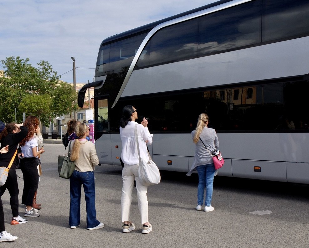 Seeing the kids off on a school trip.