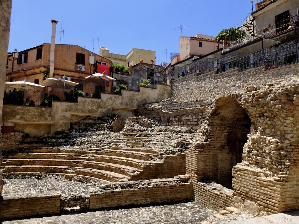  Walking tour with Chiara Rozzi.  After explaining the ODEON, Chiara left us here.  “In the Greco-Roman world, the OEDON was a small theatre for musical and literary performances.”  “It was built directly by the Romans when Taormina became a military