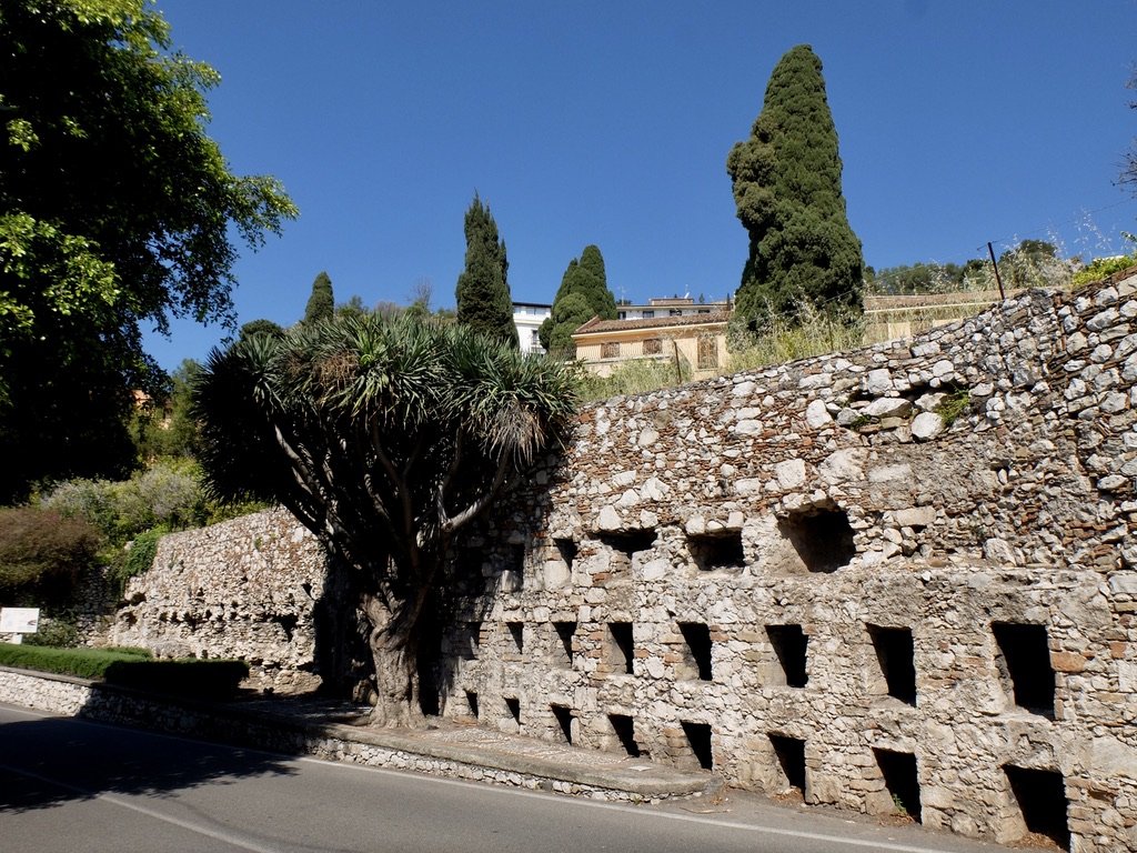  But first, a cemetery on Pirandello Road. 