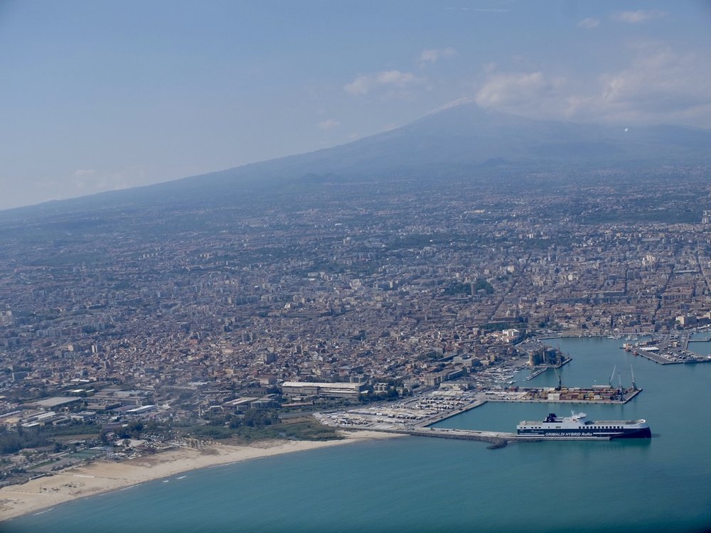  Catania from the air.  Catania is the second largest city, after Palermo, on Sicily.  Like Palermo, it’s on a flat plain. 