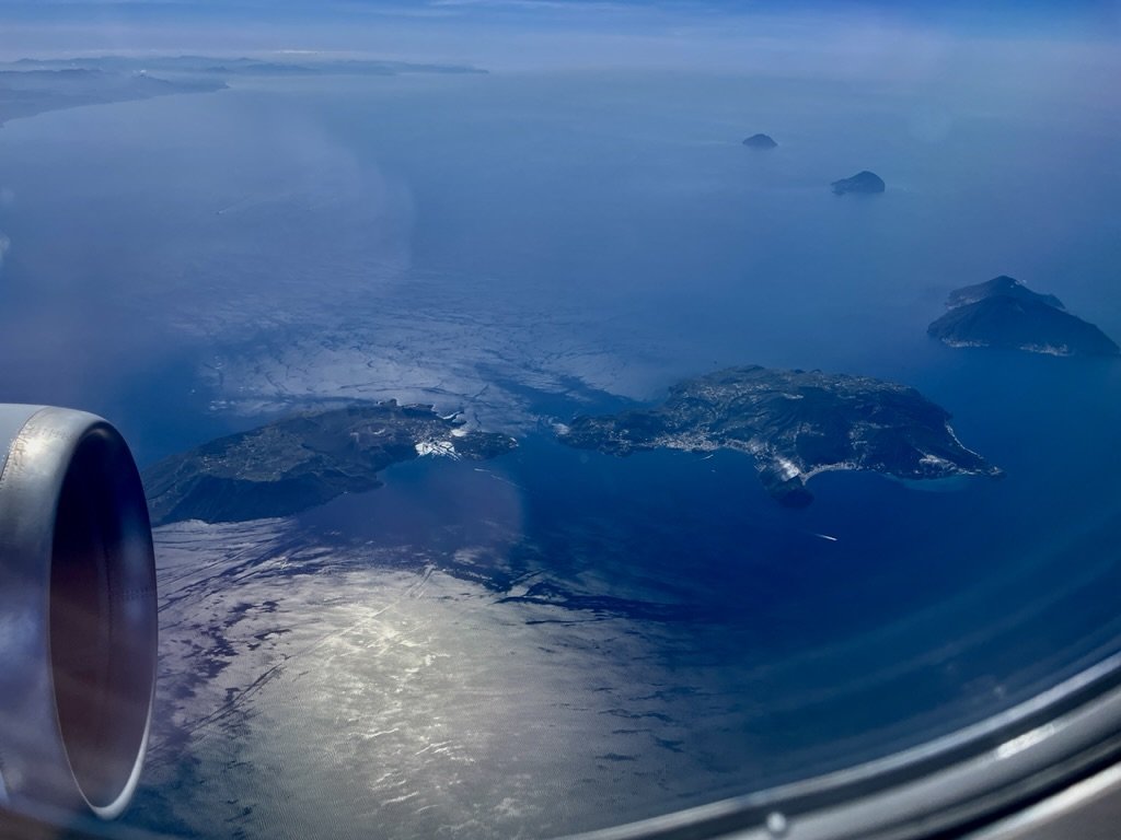  Flight from Catania to Roma - Aeolian Islands, off the coast of Sicily, from the air - Isole Eolie o Lipari: Alicudi, Filicudi, Lípai, Vulcano.  We had seen them from Abbazia Santa Anastasia in Castelbuono, many days earlier.   