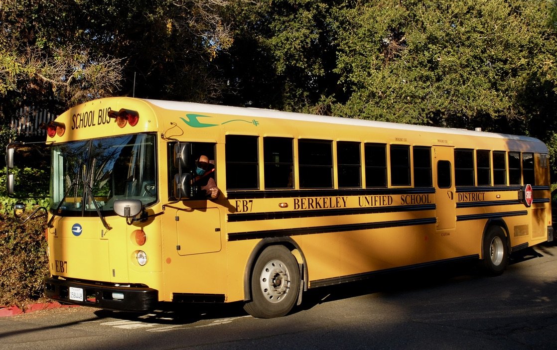 Here was a happy school bus driver driving the streets of Berkeley in a brand new electric bus.  