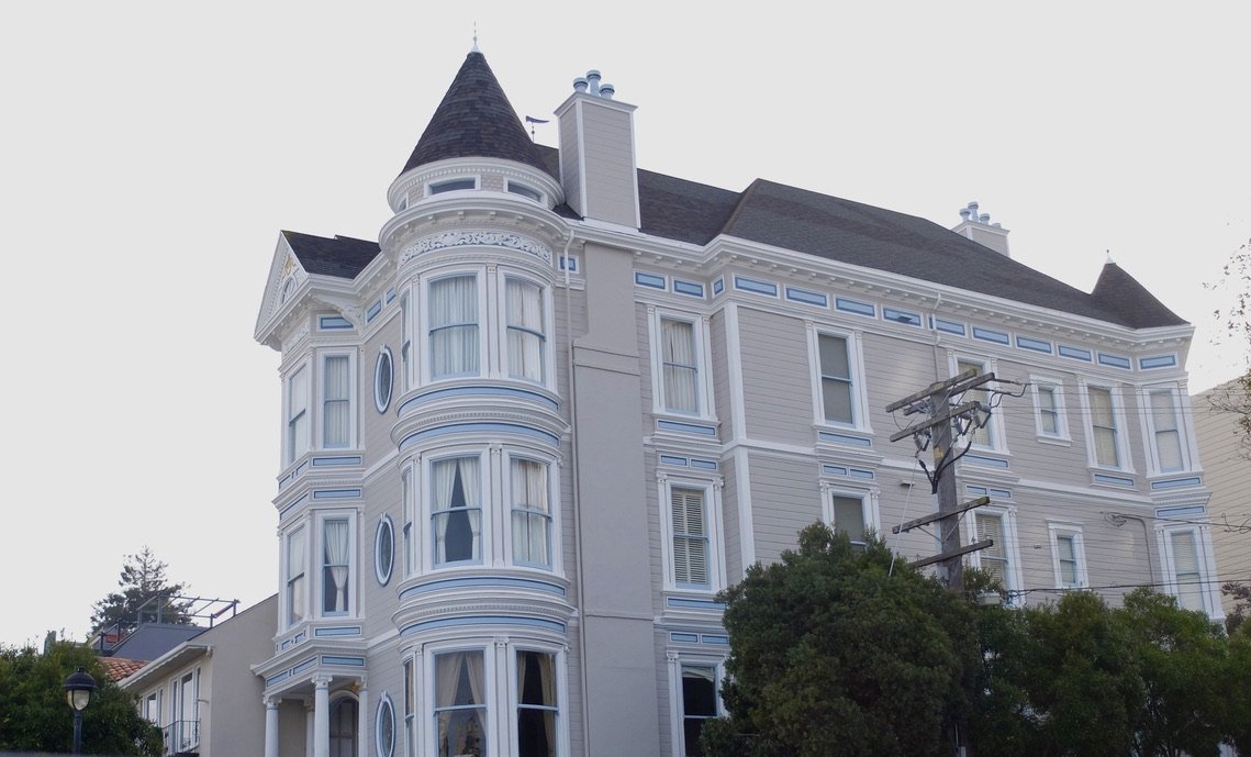  I had just finished reading  The Missing Piece: A Novel  by John Lescroart.  Several scenes took place on Green &amp; Octavia Streets in San Francisco; maybe in this building?? 