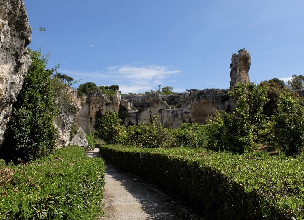  Stone quarry &amp; prison that was transformed into a garden, a "paradise" of lemon &amp; orange trees. The stone pillar is all that remains of what used to be a roof. 