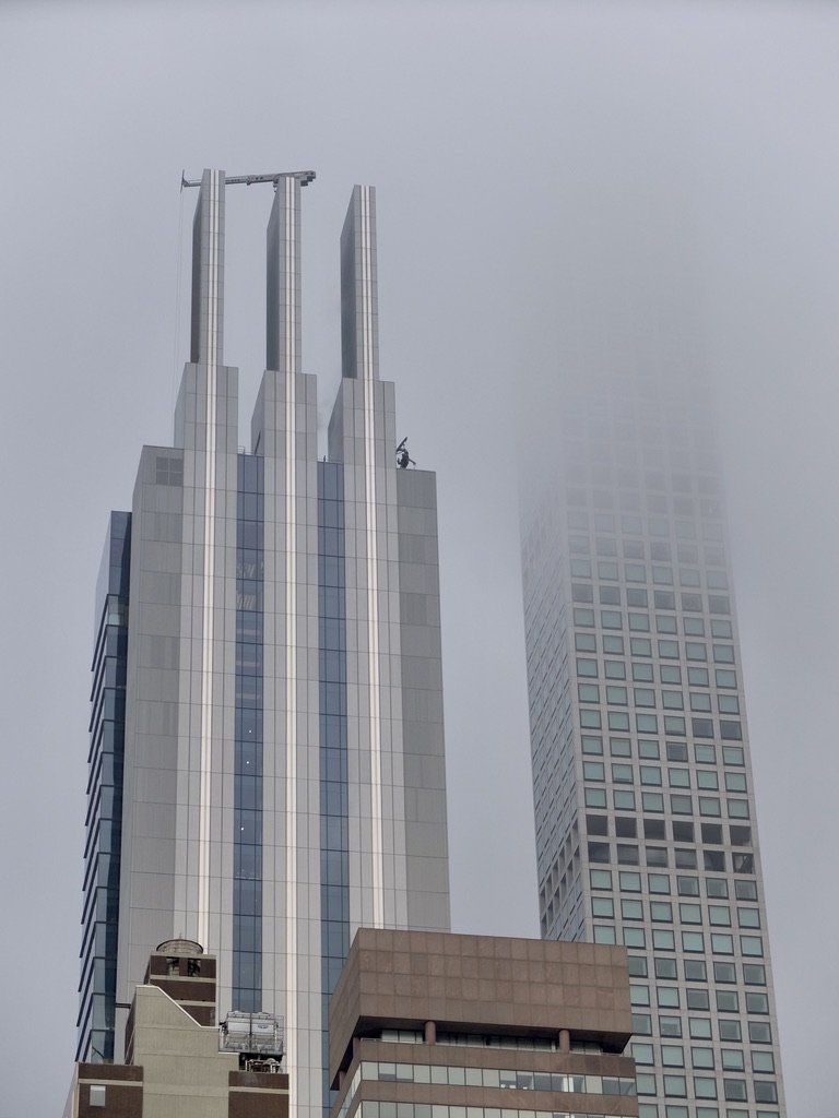 I wondered if the folks in the upper penthouses in 432 Park Ave. were above the cloud line.
