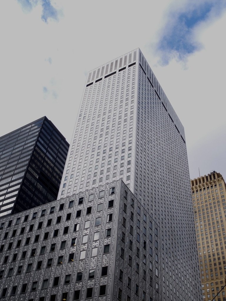  On East 42nd Street.  I was intrigued by the metal facing on this building.  Perhaps an architect viewing this blog (Matt P.) knows about this edifice? 