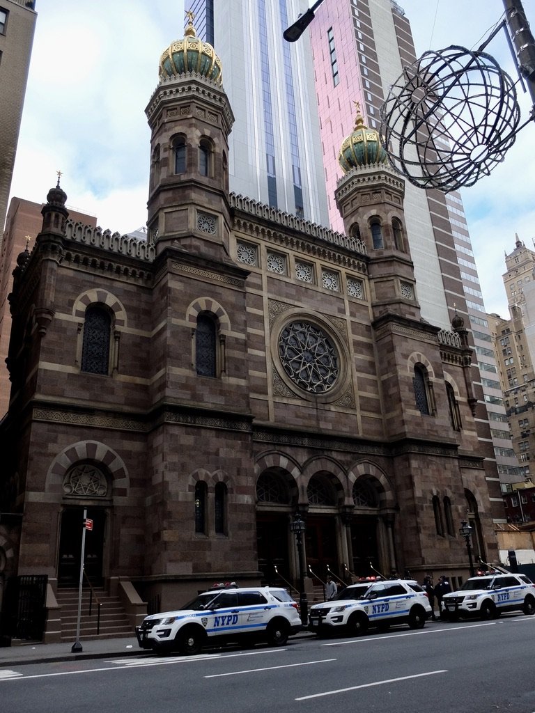  A sign of the times in front of c. 1872 Central Synagogue.   “…designated a New York City Landmark in 1966 and a National Historic Landmark in 1975,  it’s  the oldest synagogue in continuous use in New York City. Central Synagogue is, according to t