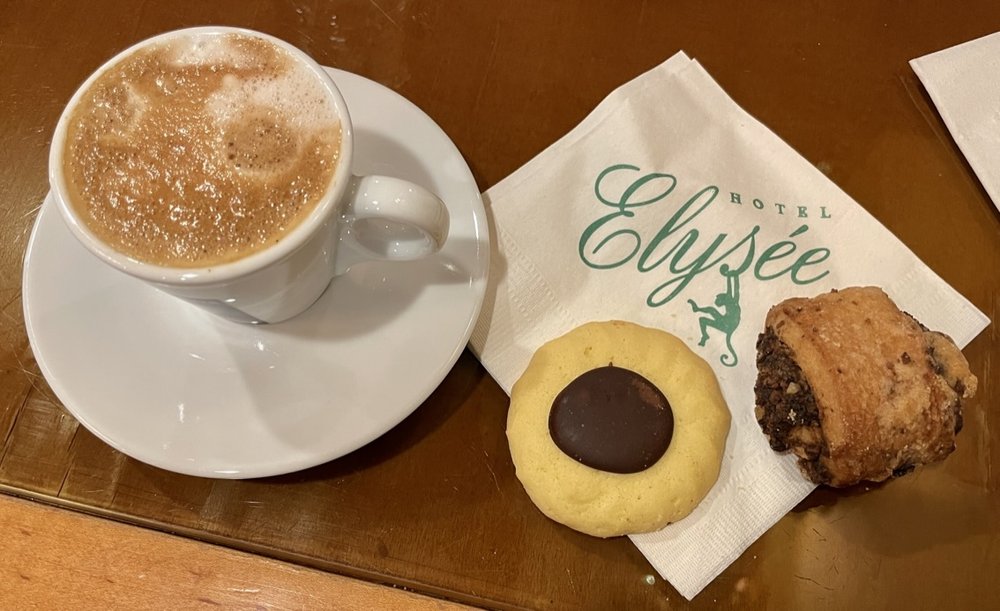  In the Common Room of the Hotel Elysée.  They had an espresso machine, snacks &amp; pastries available all day. 