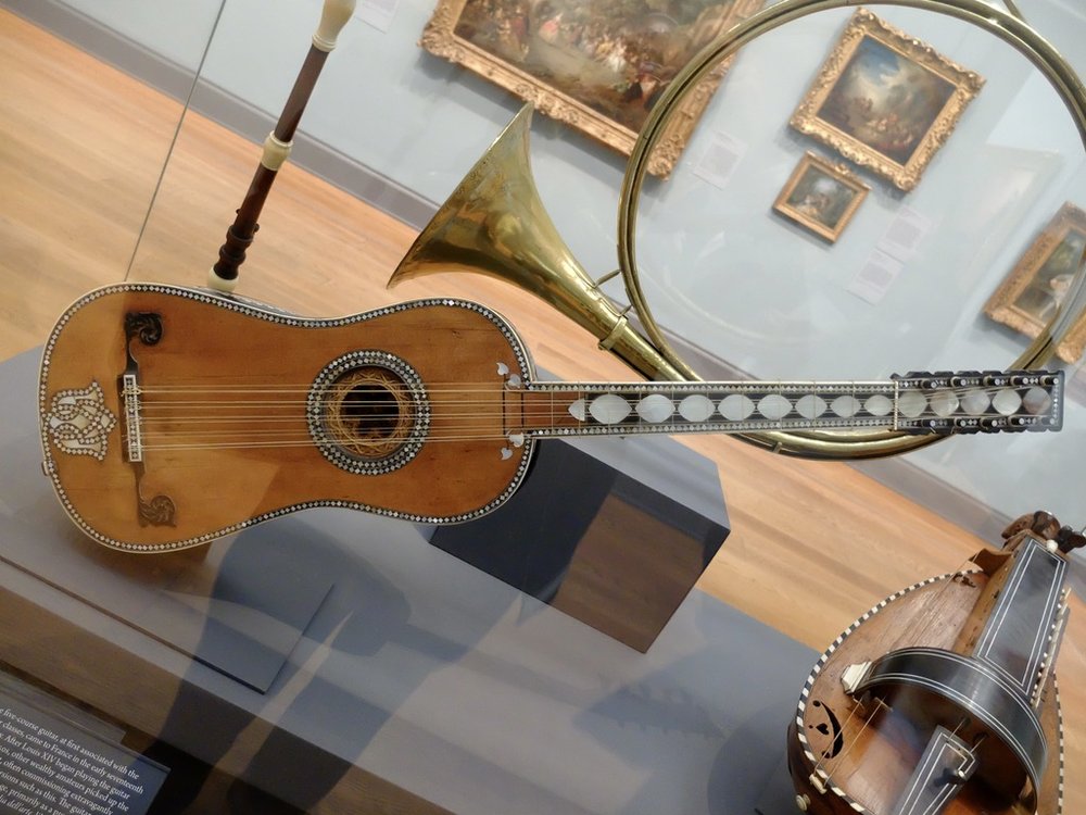  This is a five  course  guitar at the MET.  The term course used in this fashion is new to me.  “A  course,  on a stringed  musical instrument , is either one  string  or two or more adjacent strings that are closely spaced relative to the other str