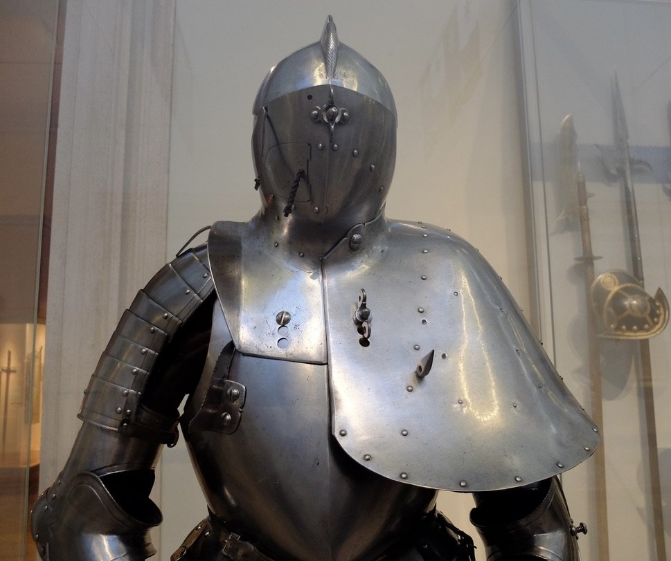  We noticed in the listing of the day’s exhibits at the Met “The Jousting Armor Philip I of Castile.”  We went to the hall that had armour. We couldn’t find it but I noticed this suit of armour &amp; wondered how  he could see out of it.  In the inte