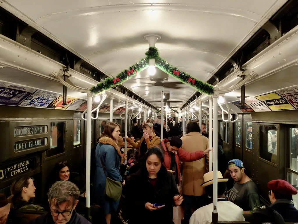  There was a representative from the Transit Museum in each car.  Our guy was so tall he was cautious of the ceiling fans.  Everyone was so nice &amp; excited about participating. 