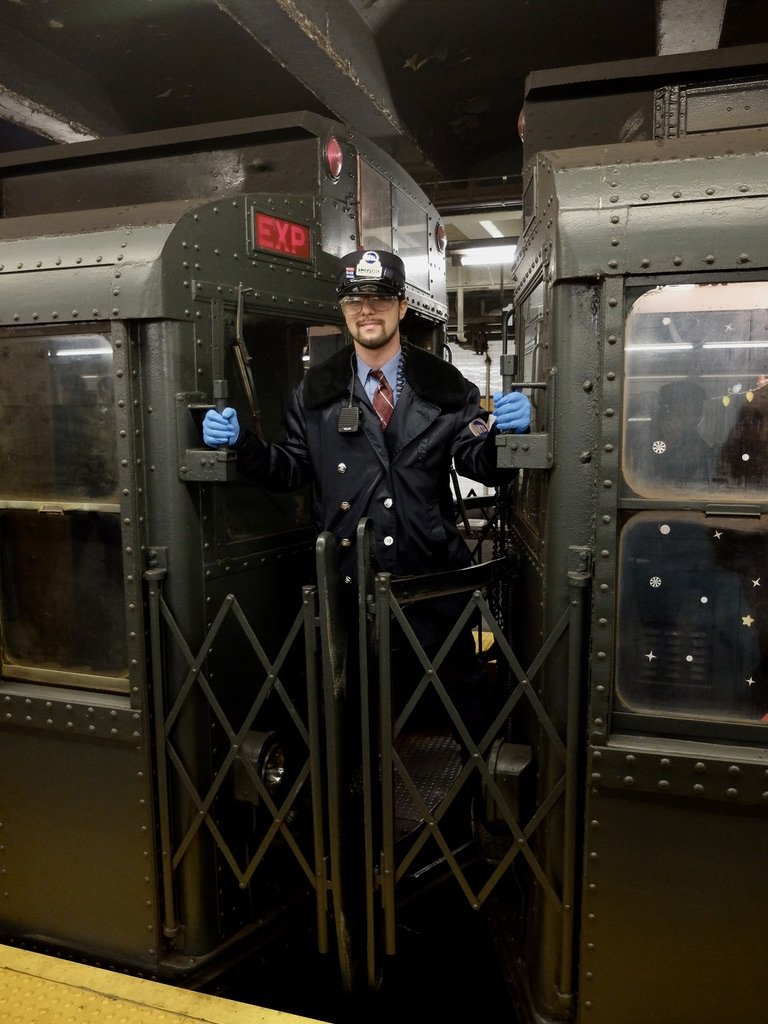  NYC Transit Museum Nostalgia ride.    I remember these conductors.  While the train was running, I could have walked between the cars, like I used to, but didn’t. 