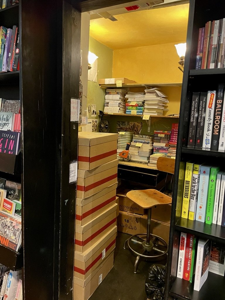  Space is often at a premium in N.Y.C.  Community Bookshop, 7th Ave., Park Slope - "Howdya Like to Work In This Space?" 