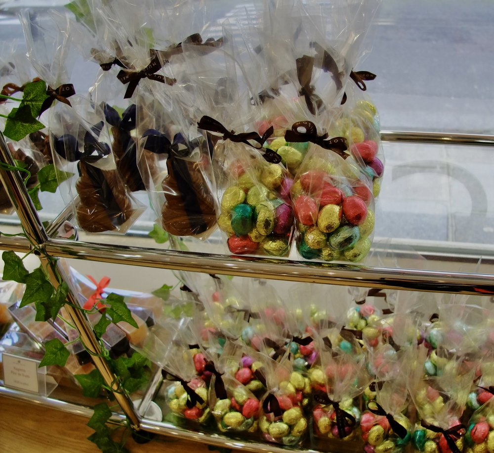  Getting ready for Easter with  a profusion of chocolates.   The following week, at the Chocoleterie Frigoulette - Baeaufort sur Gervanne, we saw a woman hand rolling the chocolate Easter eggs in foil.   