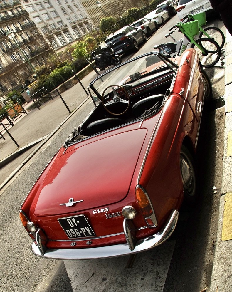 A rare sighting of a vintage auto in Paris.