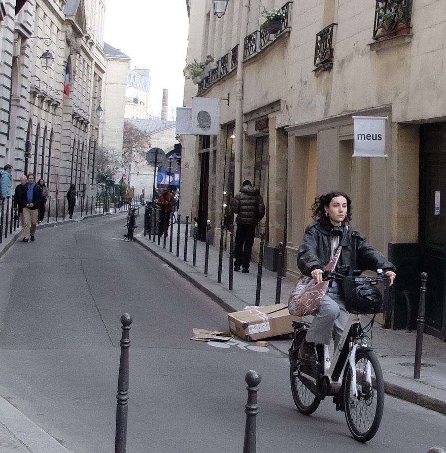 A pretty safe street to bicycle on but it is shared with cars.