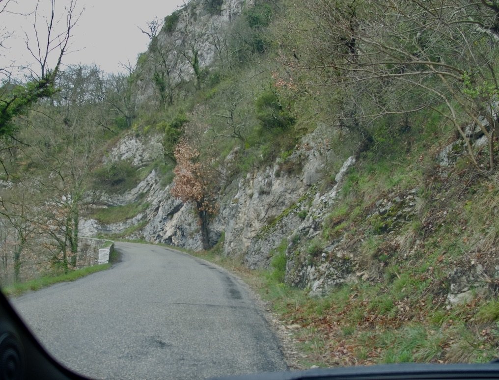 …where the road narrowed with a stone mountain on one side &amp; stone barrier on the other.  We would have had to back up.
