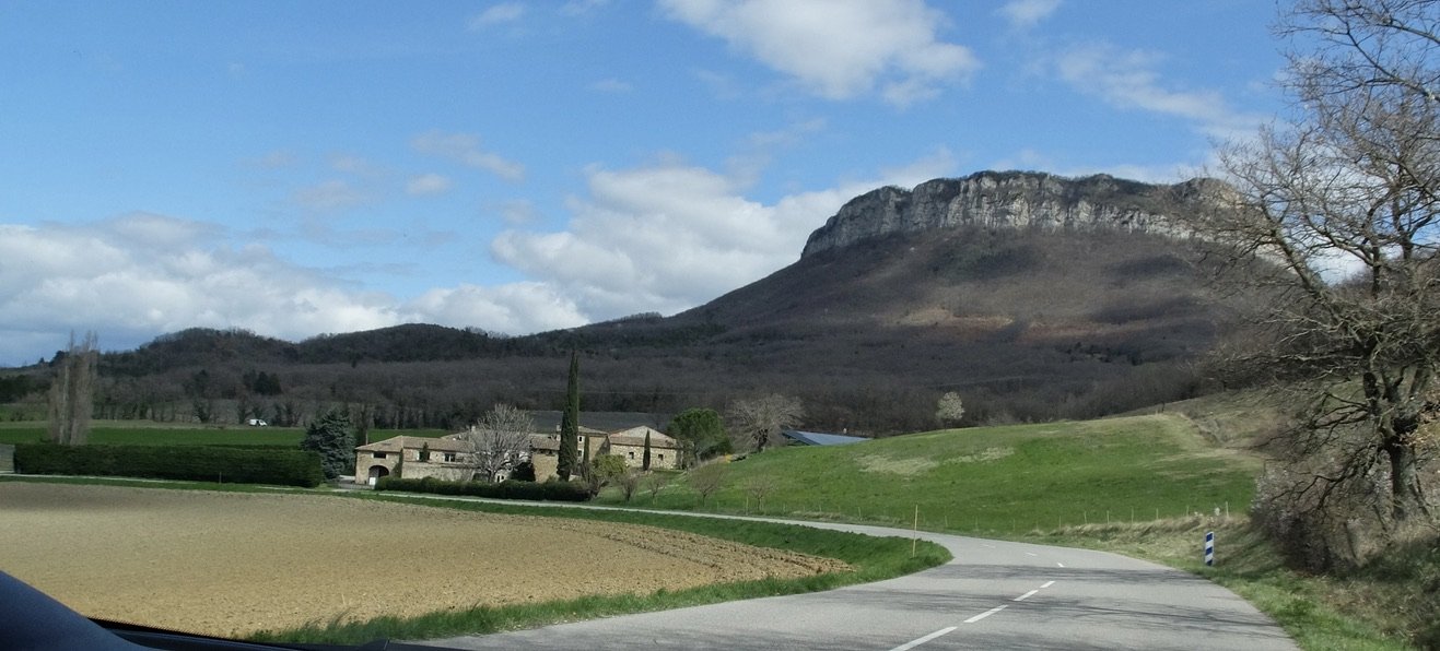  Note the array of solar panels to the right of the farmhouse. 