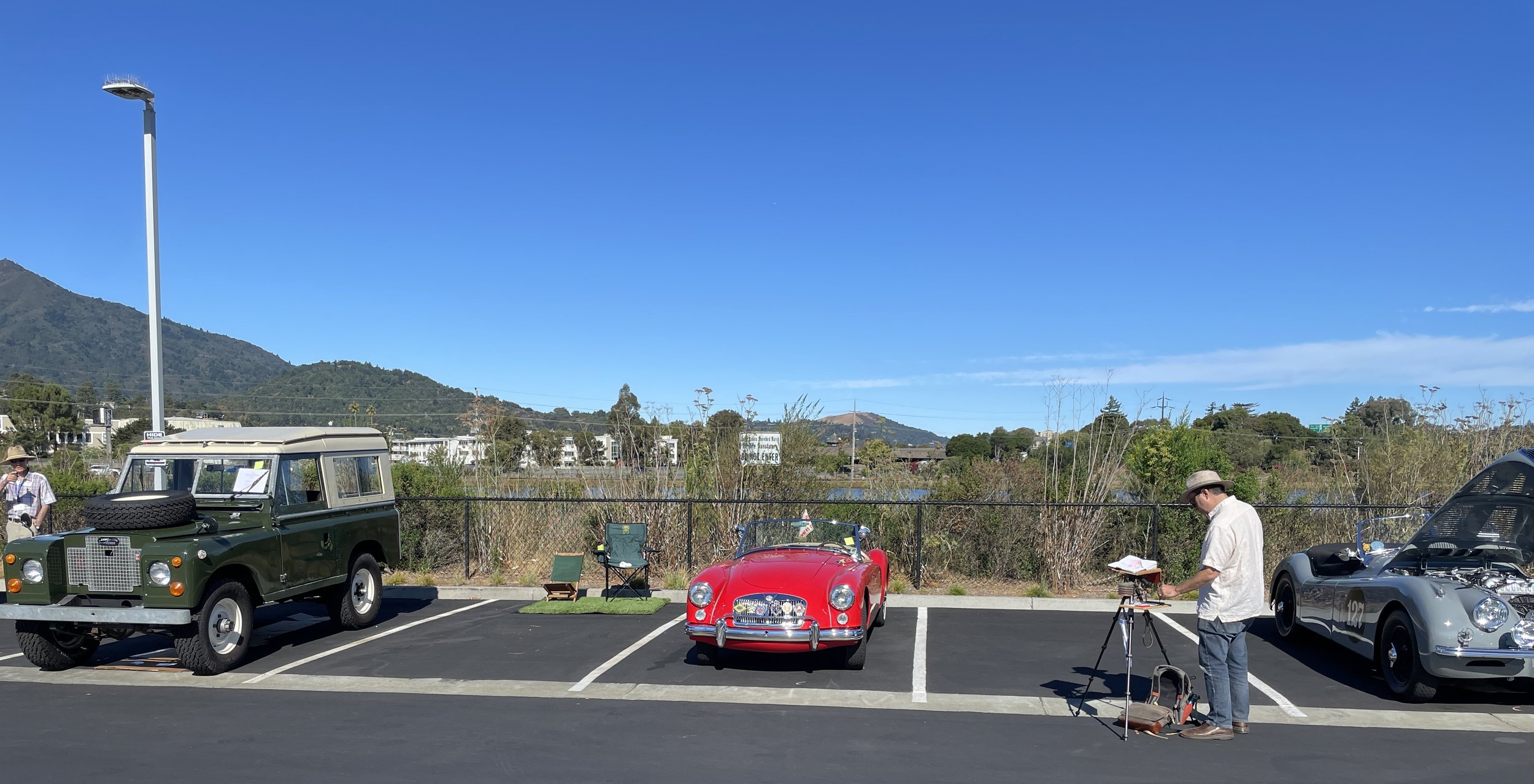 My MGA sandwiched between Kim's handsome 1971 Land Rover & a beautifully restored Jaguar. Michael Scherotter decided to paint the MG.