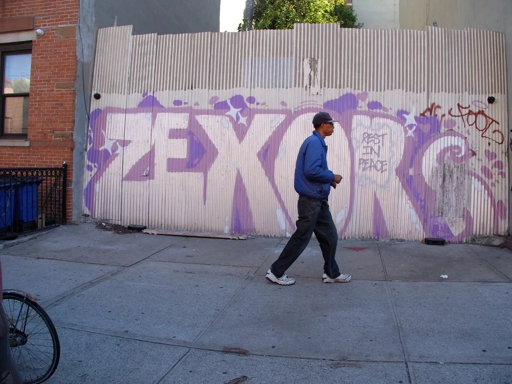 The graffiti keeps changing &amp; the abandoned bike is still there after all these years, on Classon Avenue.