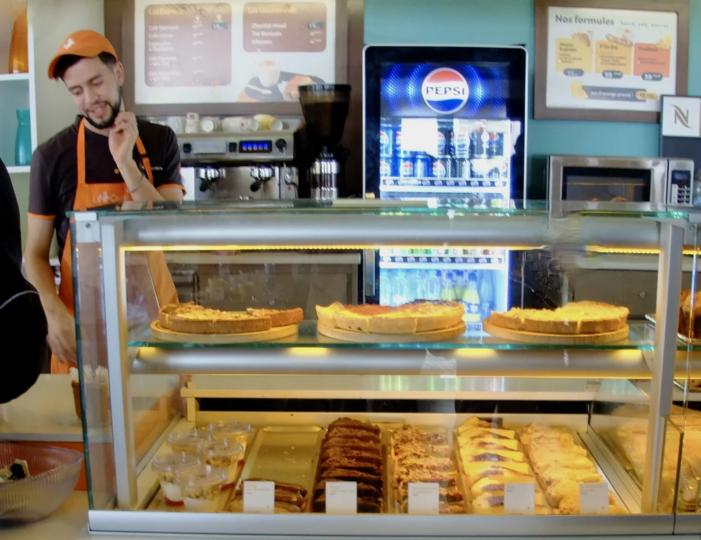  On the road Rabat to Fes - La Croissanterie. We got the Marin sandwich a Pepsi &amp; a Fanta.  Pepsi &amp; Coke were about equally prevalent in Morocco. 