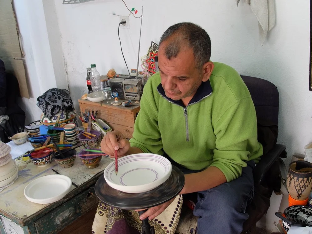  Ain Nokbi.  Incredibly, he &amp; all the others were working free handed. I learned in dental school to always have a finger rest for stabilization. 