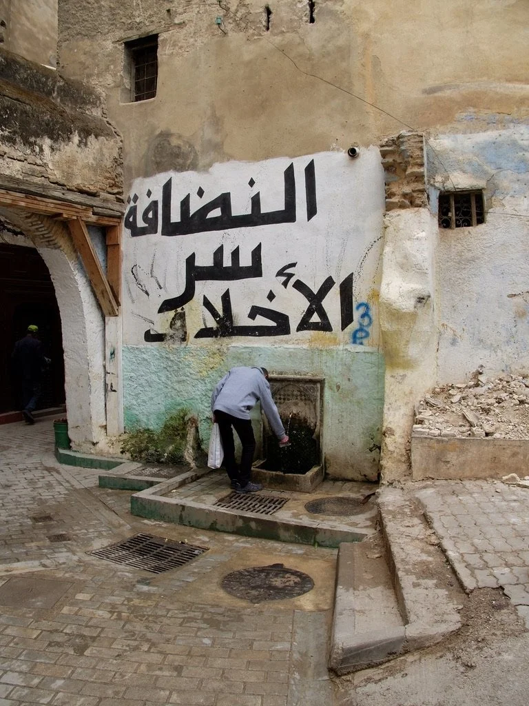  Near our Karawan Riad in Fes.  The message conveyed by the sign at this water fountain is that your mother doesn’t live here, clean up after yourself. 